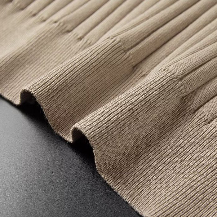 Dario Knit Polo — ribbed-knit hem fabric texture detail