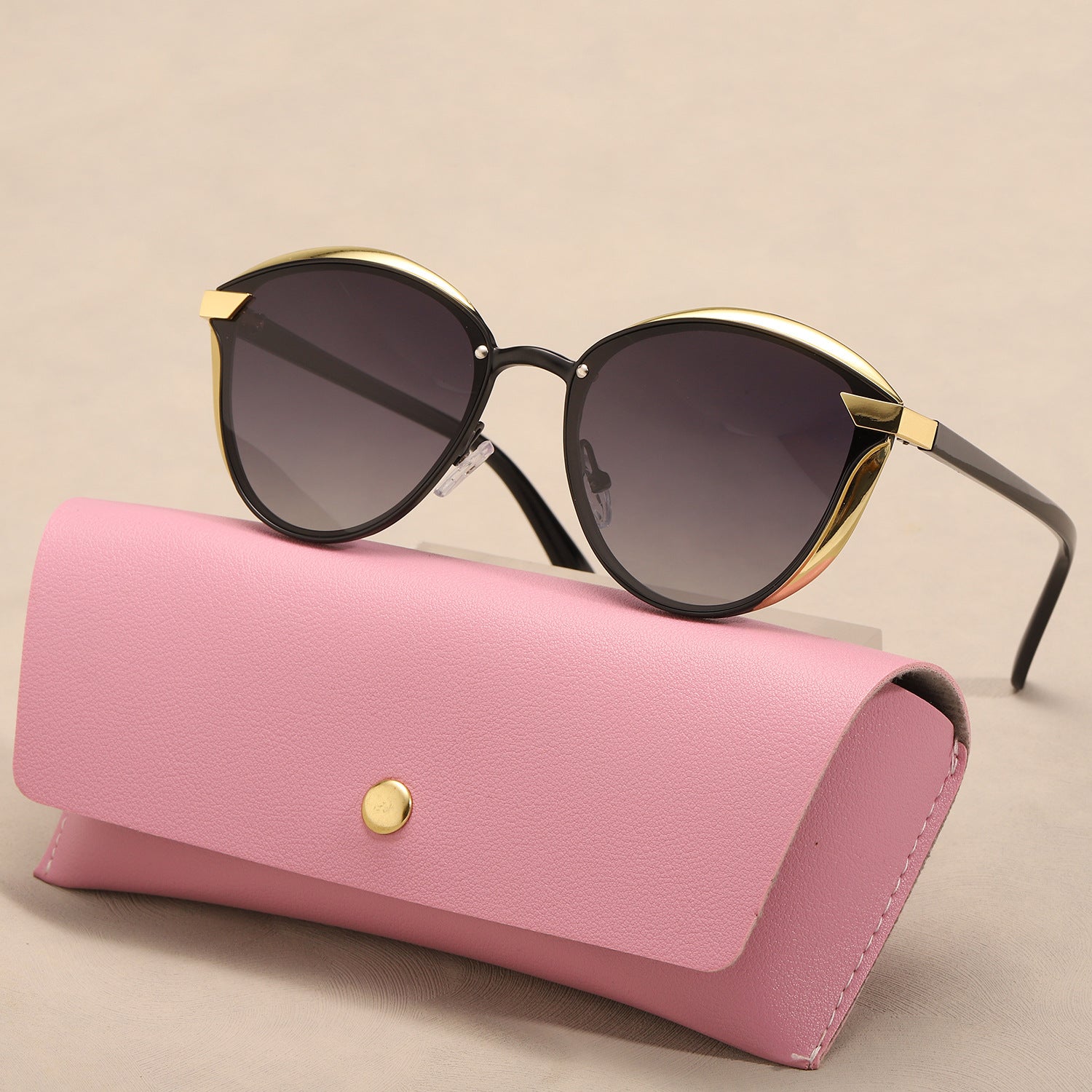 Yasmine Cat-Eye Sunglasses in Black — gold-tone metal trim with gradient lenses