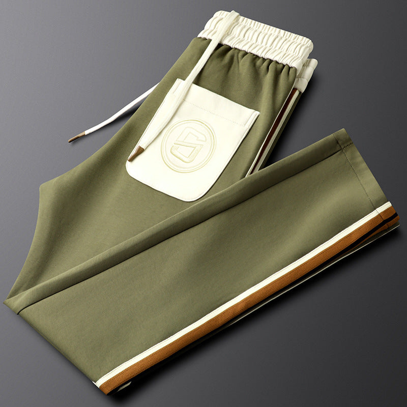Cooper Track Pants in Olive Green – product view