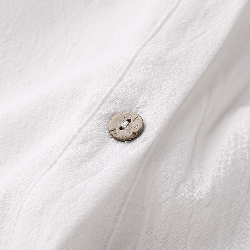 Fiorella Linen Jumpsuit — coconut button detail closeup